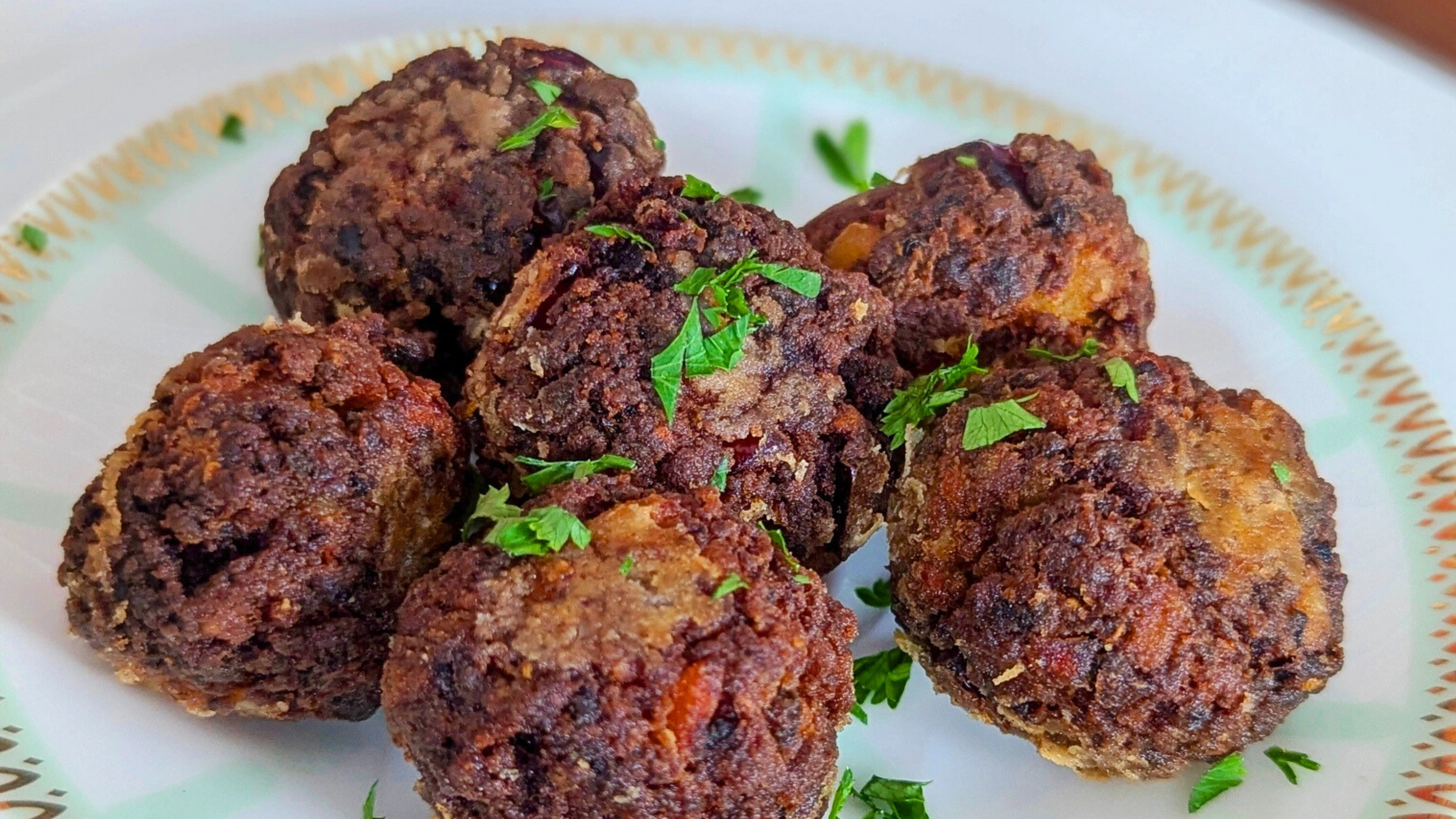 Load video: Boulèt Haitian Meatballs Recipe